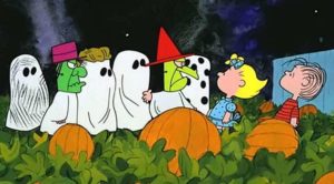 Linus, Sally, and the rest of the Peanuts gang in the pumpkin patch