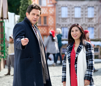 Liza Lapira and Neal Bledsoe in "Must Love Christmas" on CBS