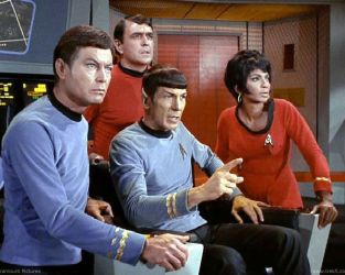 Spock, McCoy, Scotty and Uhura in "Star Trek"