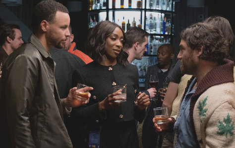 "Mr. Throwback" Episode 101 -- Pictured: (l-r) Stephen Curry as himself, Ego Nwodim as Kimberly, Adam Pally as Danny -- (Photo by: David Moir/Peacock)