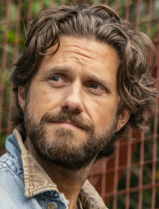 Aaron Tveit (Charlie) in "Earth Abides" on MGM+ - photo from MGM+ press site